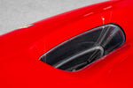 Capristo carbon fiber front air vent in the bonnet of a red Ferrari F8