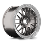 Two-piece forged wheel with gunmetal center and polished stepped lip, multi-spoke design shown at angle - APEX Wheels wheel for 20x12 ET47 PSCL - Anthracite - Machined Lip