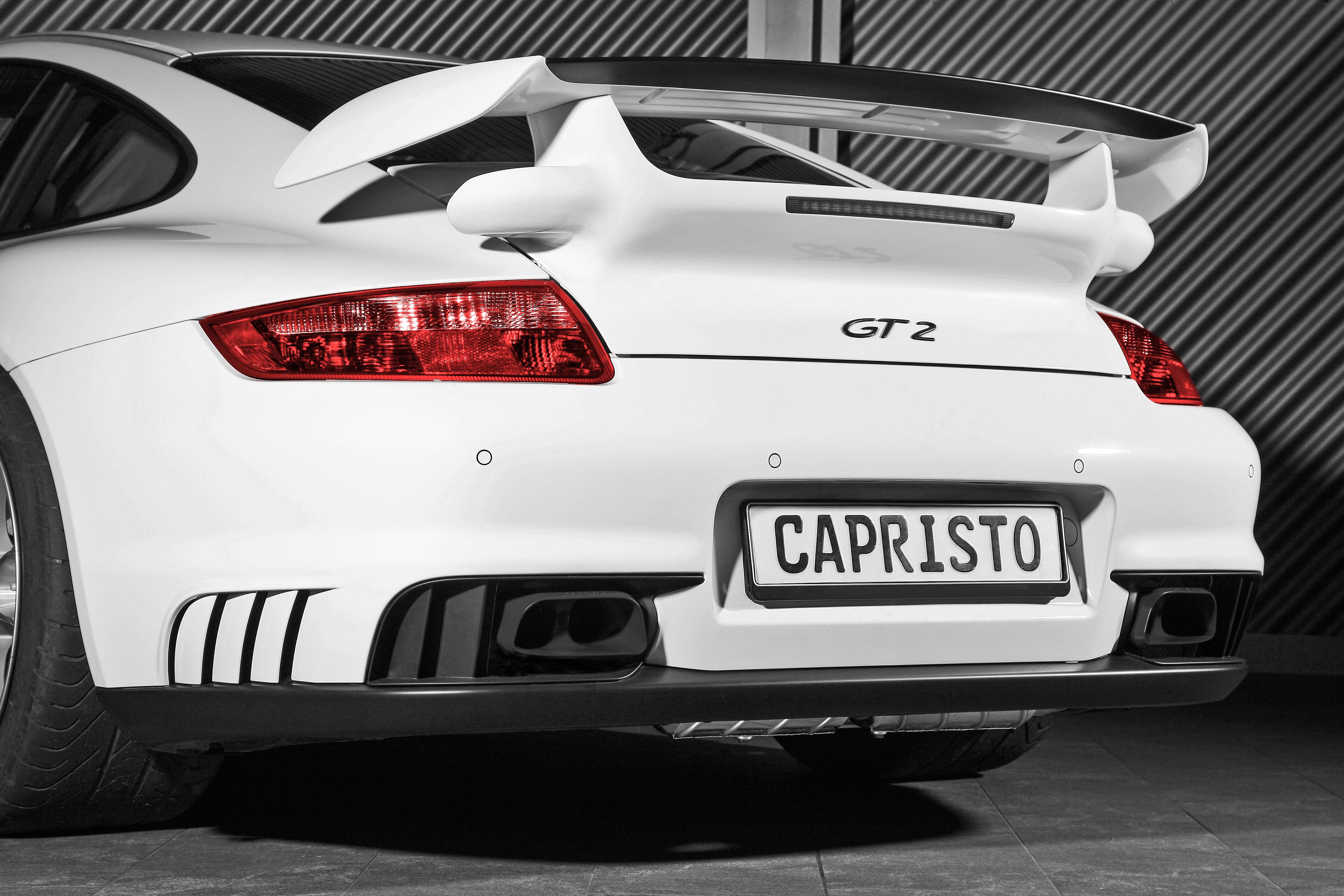 White Porsche 997 GT2 rear view fitted with Capristo valved exhaust