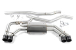 A studio product shot on a white background showing the complete Dinan Valved Cat-Back Exhaust System for the BMW X3 M40i. The system is laid out to show the brushed T304 stainless steel construction, featuring a large single mid-pipe that connects to a rear muffler with quad black ceramic coated exhaust tips.