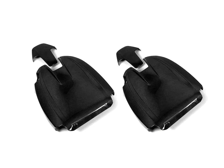 A front view of AUTOTECKNIC DRY CARBON FULL SEAT BACK COVER SET | BMW G82/ G83 M4 2021+ with white background