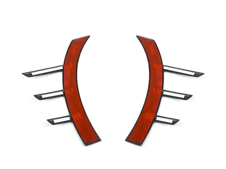 A back view of AUTOTECKNIC DRY CARBON FRONT FENDER ARCH TRIM SET - BMW G87 M2 2023+ with white backgroundd