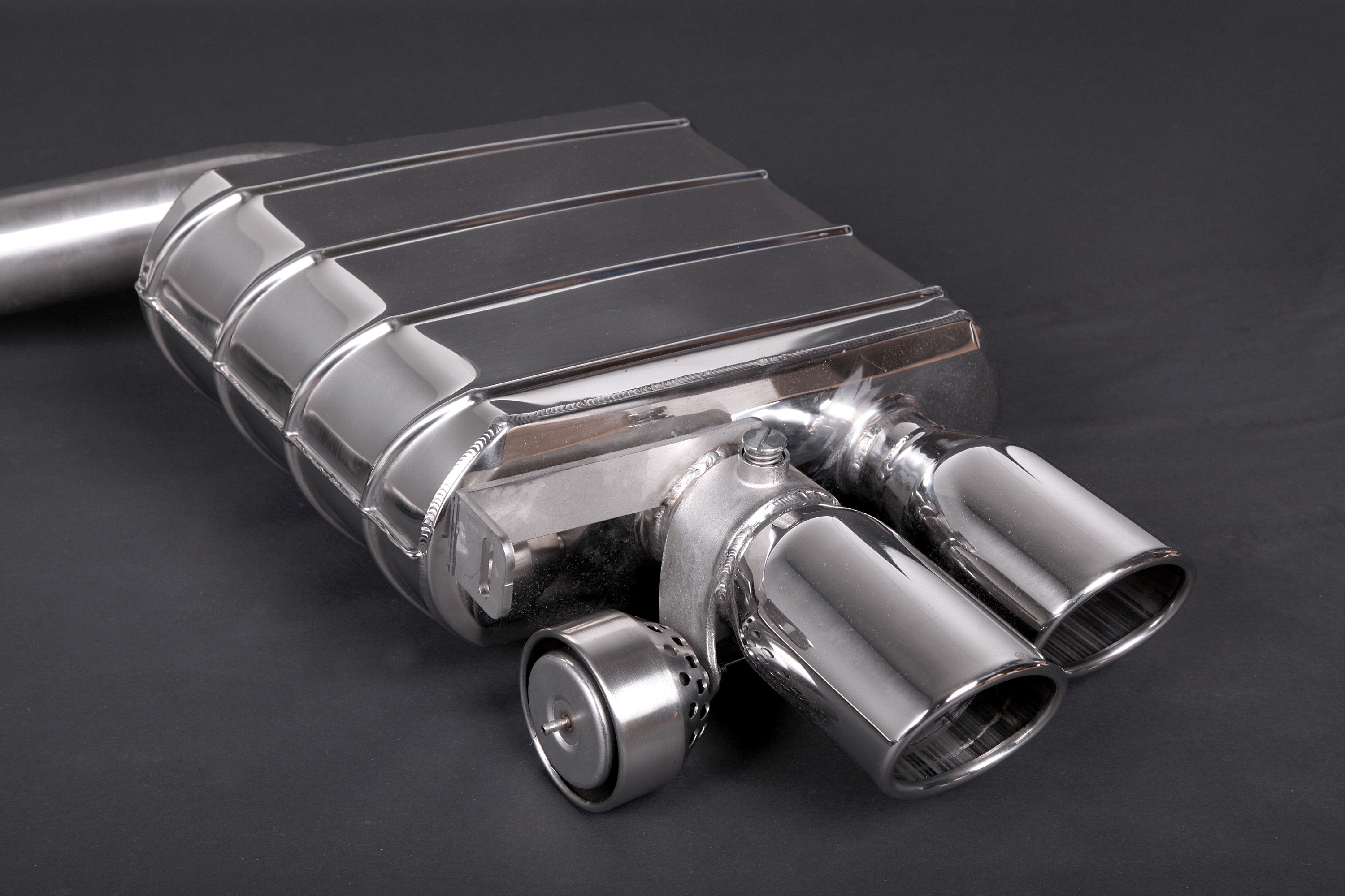 Capristo Alpina B5 F10 valved muffler with polished twin tips and valve, close-up