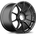 Gunmetal colored alloy wheel with ten-spoke design shown at angle on clean white background - APEX Wheels wheel for 19x12 ET47 PSCL - Satin Black