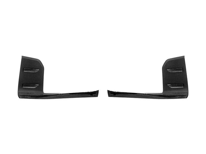 A close up side view of AUTOTECKNIC DRY CARBON PERFORMANTE FRONT LIP - BMW G87 M2 2023+ with white background