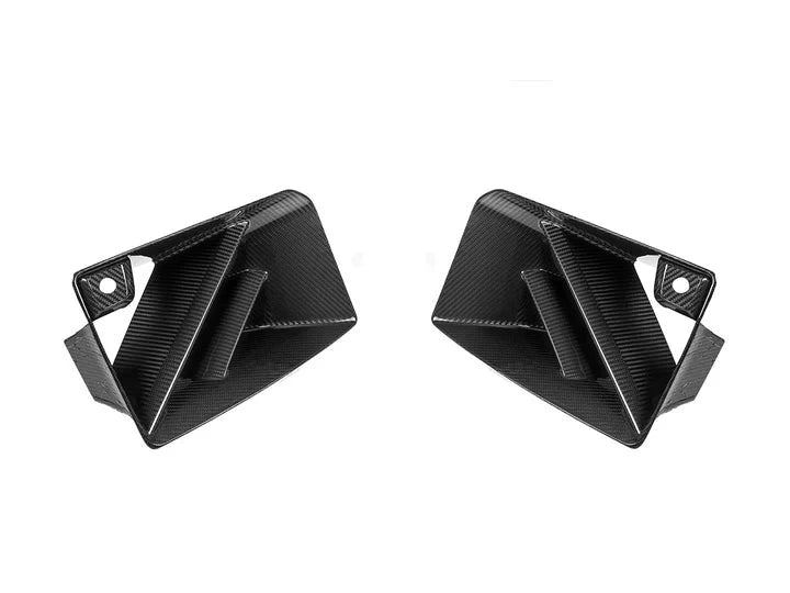 A side back view of AUTOTECKNIC DRY CARBON CORSA FRONT AIR INLET TRIM SET - BMW G87 M2 2023+ with white background