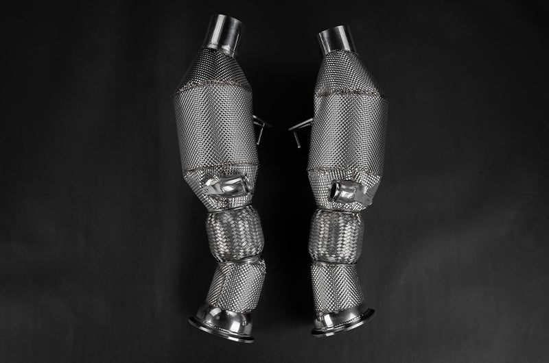 Pair of heat-wrapped Capristo pipes with flex sections for Ferrari 296