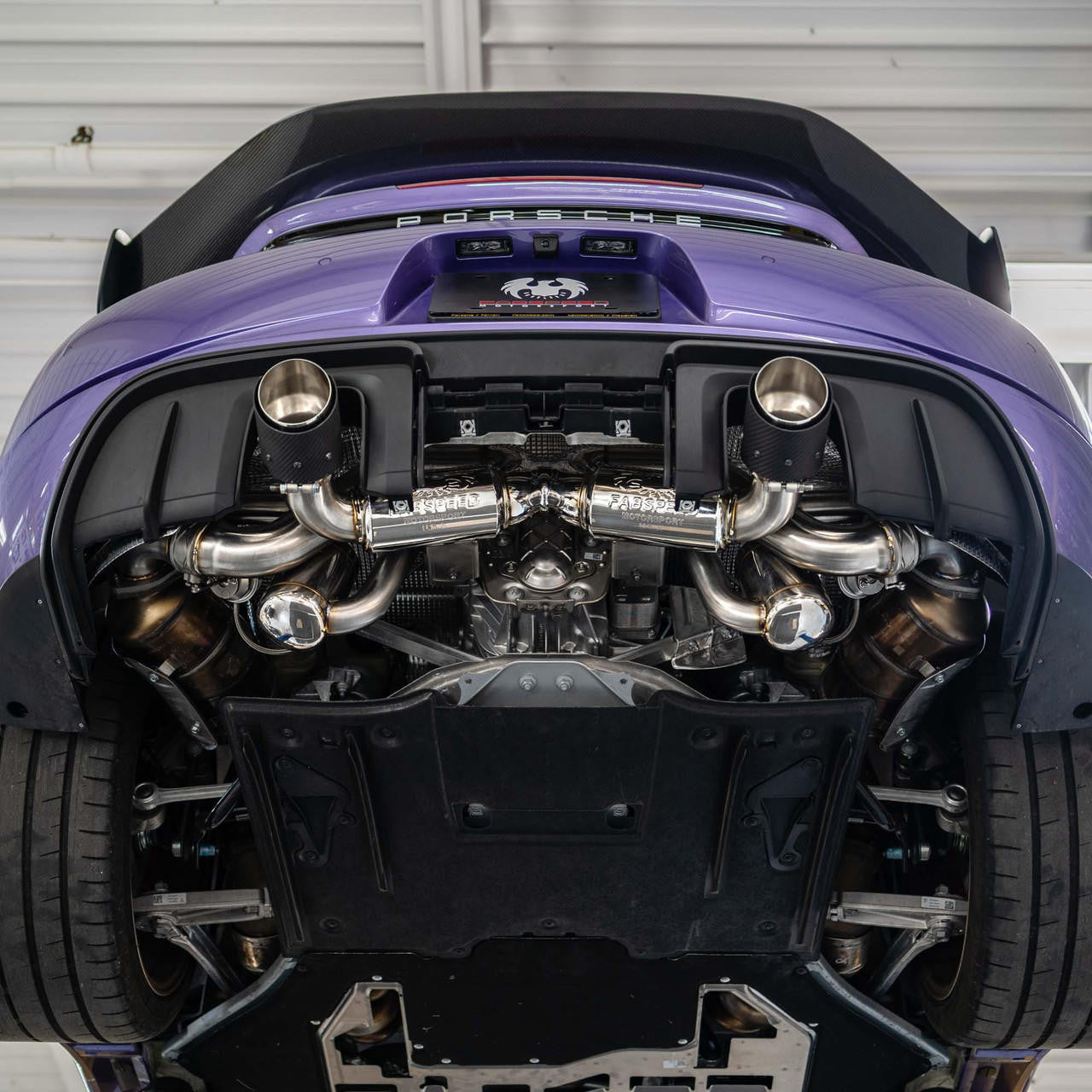 Purple Porsche GT4 RS with the titanium valved exhaust installed