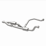 MagnaFlow 21-513 oem grade direct-fit catalytic converter, opposite rear three-quarter view of the turntable spin