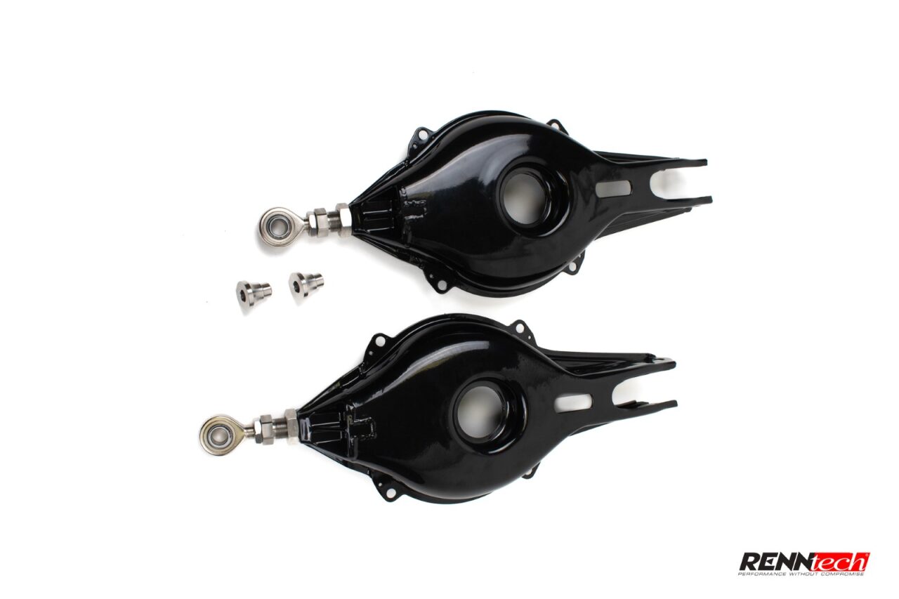 Rear lower control arms with mounting bolts laid out - Adjustable Rear Lower Control Arm for the 1992-1999 S-Class