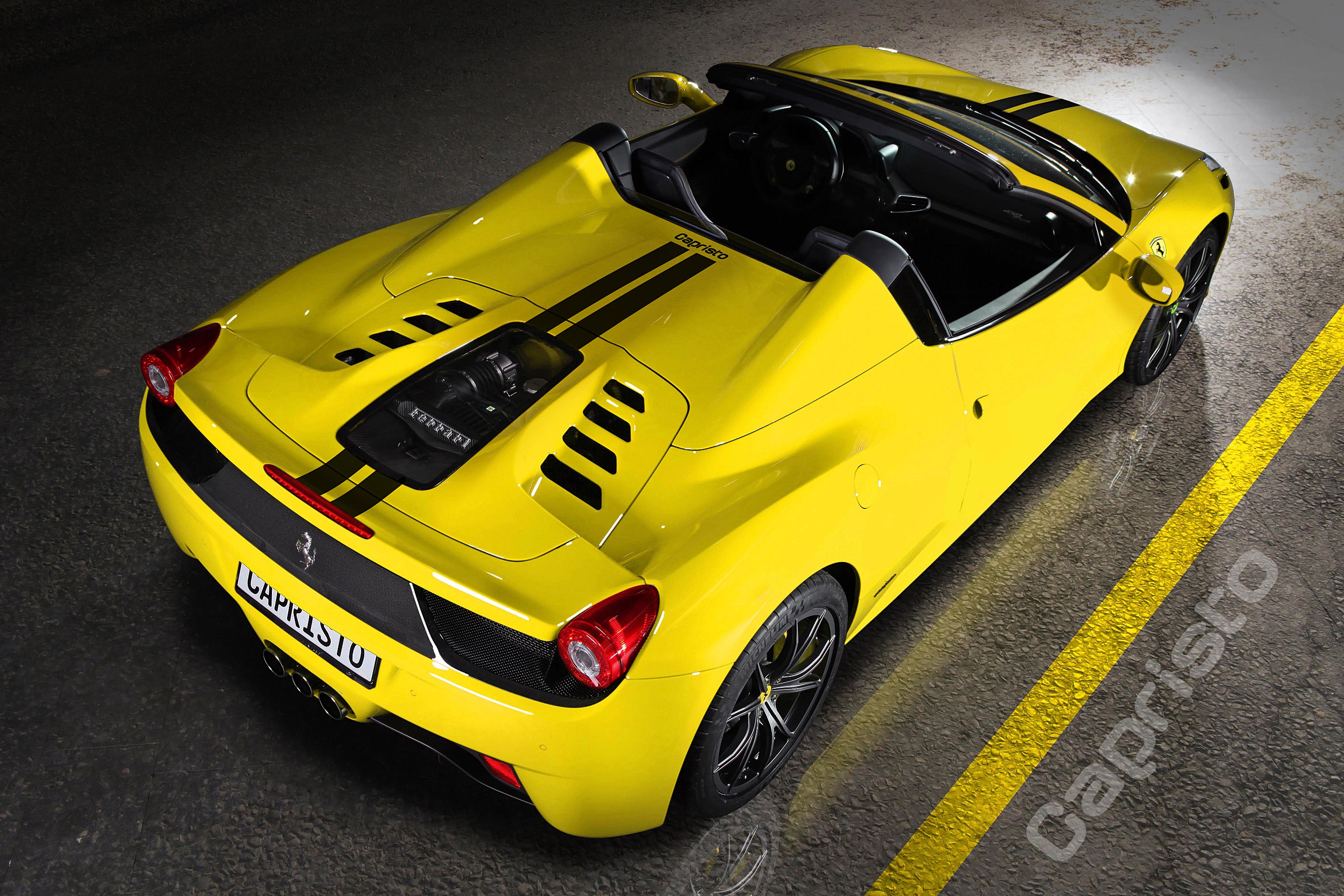 Capristo carbon fiber and glass bonnet on a yellow Ferrari 458 Spider