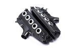 Black carbon fiber intake plenum with five circular inlet ports and polished aluminum velocity stacks on white background - Eventuri inlet plenum for BMW E60 M5 E63 M6