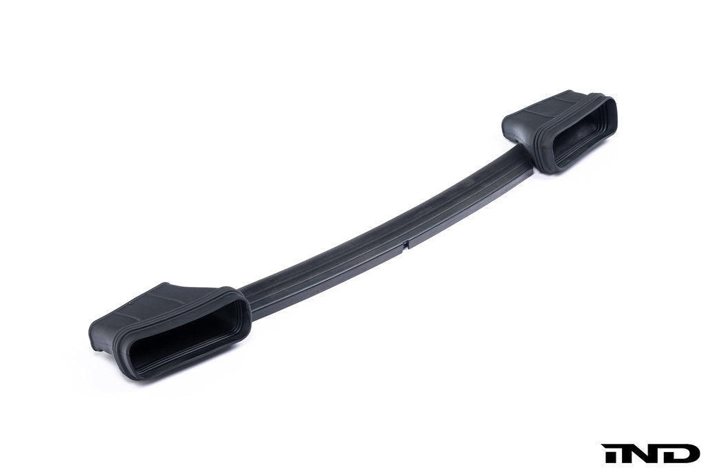 A close up side view of Eventuri Black Carbon Intake System For BMW F9X X5M / X6M / G09 XM with white background