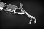 Close-up of Capristo Huracan valved muffler with valve housing and round polished tips