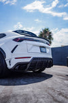 White Urus rear three-quarter showing the rear diffuser