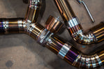 A close-up of the electronic valve actuator and high-quality welds on the heat-treated titanium exhaust piping.