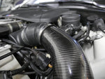 A close up view of RK Autowerks F1X M5 M6 CARBON FIBER INTAKES fitted on a car
