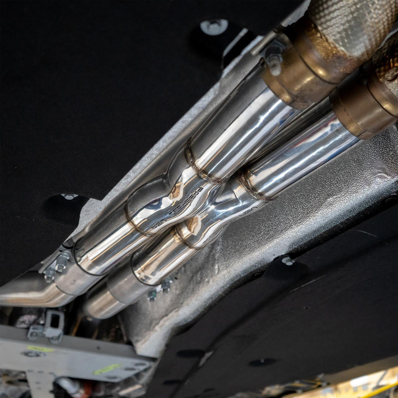 Fabspeed 812 GTS X-pipe installed, angled underside view