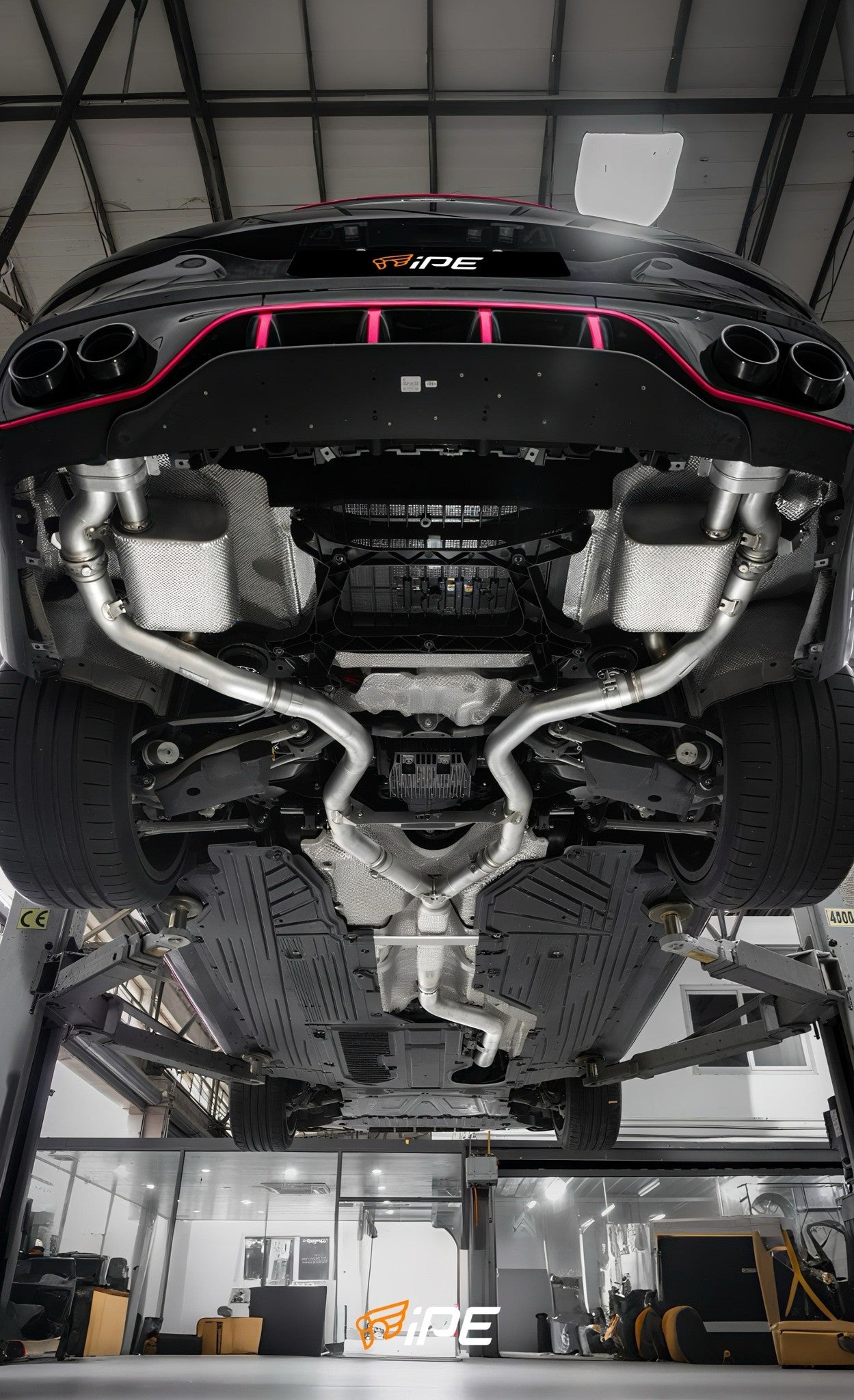 Underside view of the IPE exhaust installed on a Mercedes-AMG CLE53