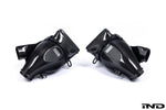 A front close up view of parts of Eventuri Black Carbon Intake System For BMW F9X X5M / X6M / G09 XM with white background