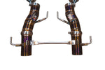 Ferrari SF90 Stradale Valvetronic exhaust: pair of heat-tinted titanium F1 pipes on white linked by a rod