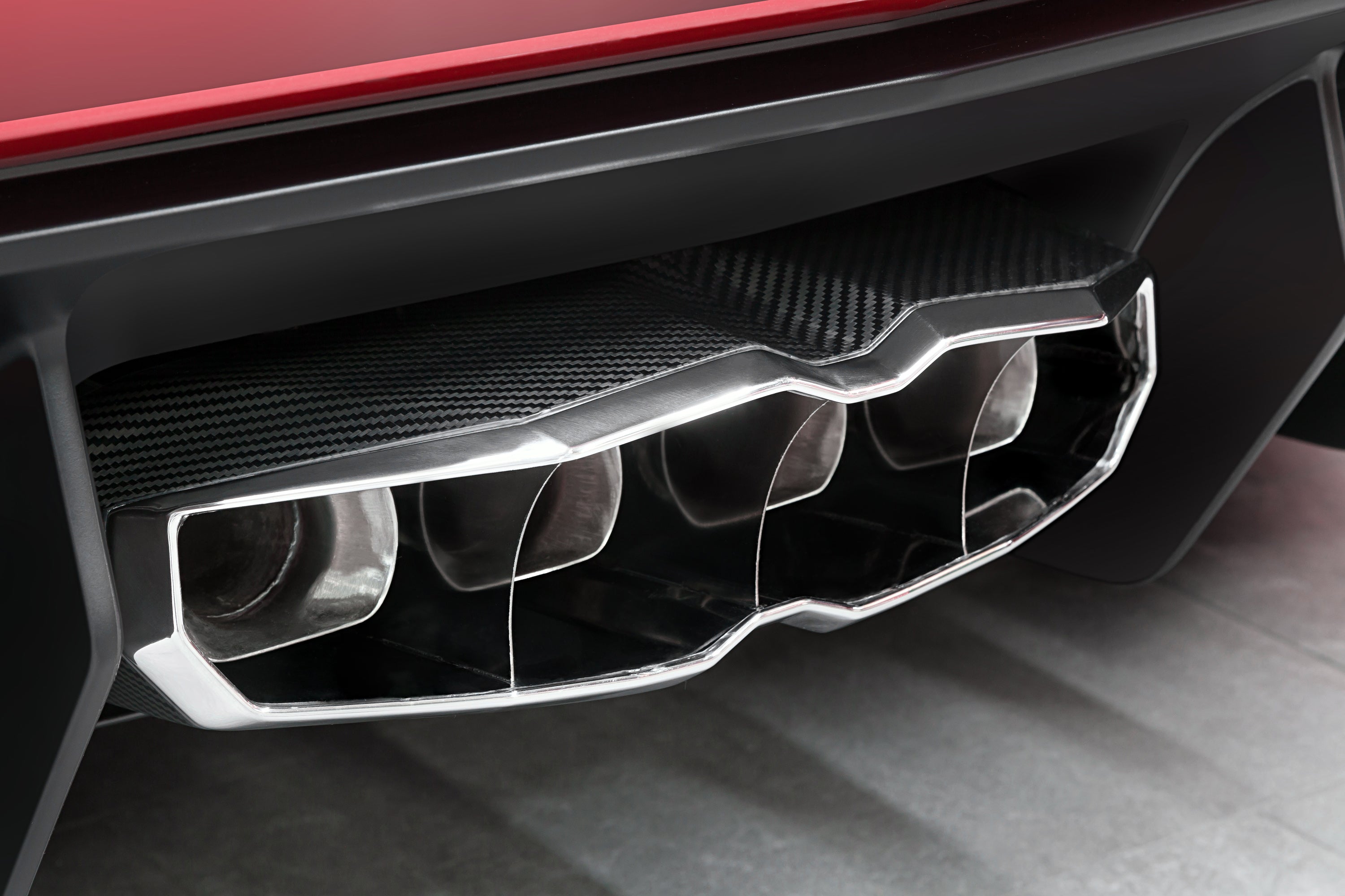 Close-up of Capristo carbon and stainless tip frame on Aventador SV