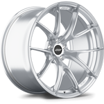 Silver alloy wheel with multi-spoke design and black center cap, shown at three-quarter angle - APEX Wheels wheel for 20x12 ET22 5x114.3 - Motorsport Gold