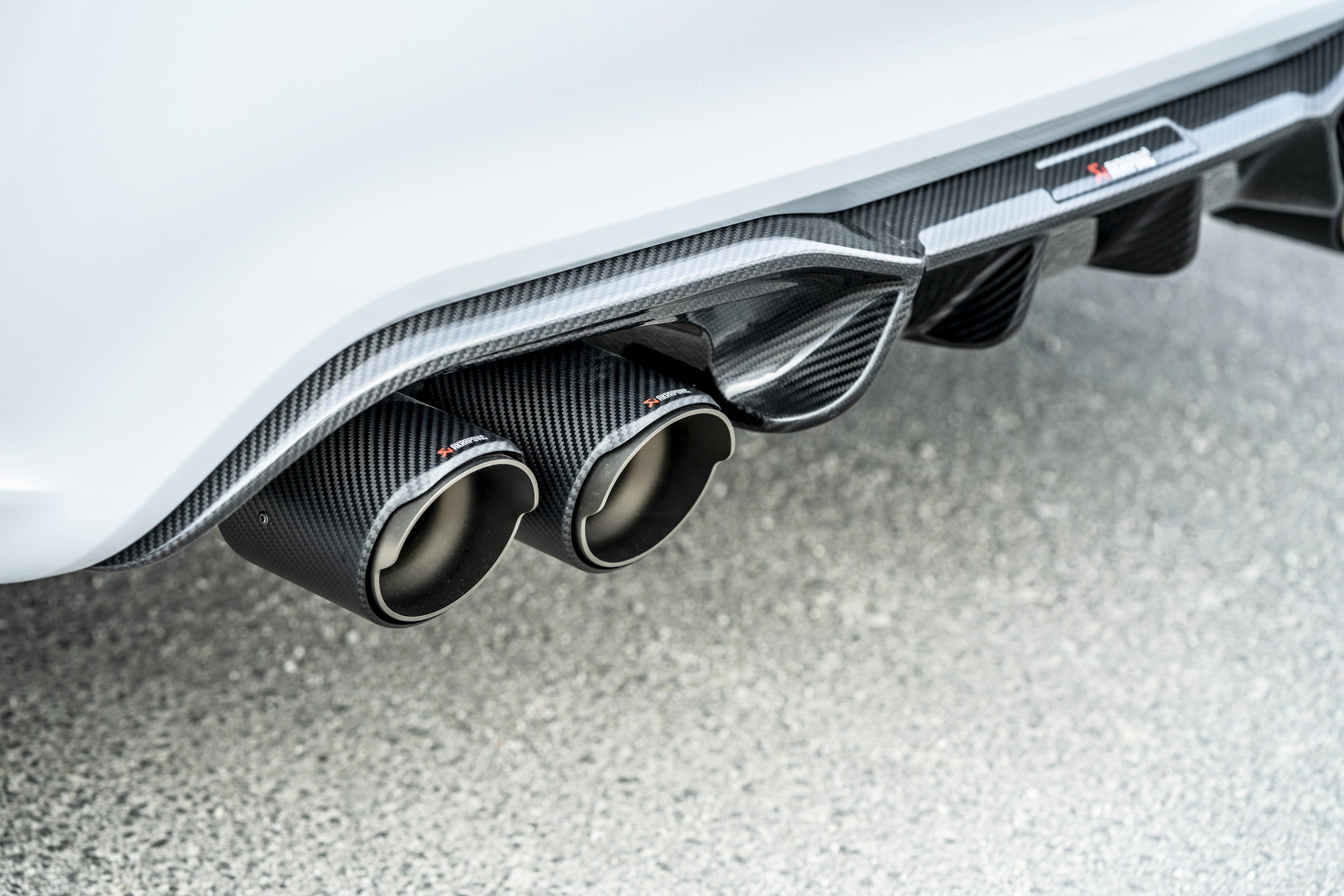 Akrapovic BMW M2 Competition (F87N) Slip-On Line (Titanium) w/Carbon Fiber Tips S-BM/T/3H for BMW M2 Competition F87 2019-2021, close-up