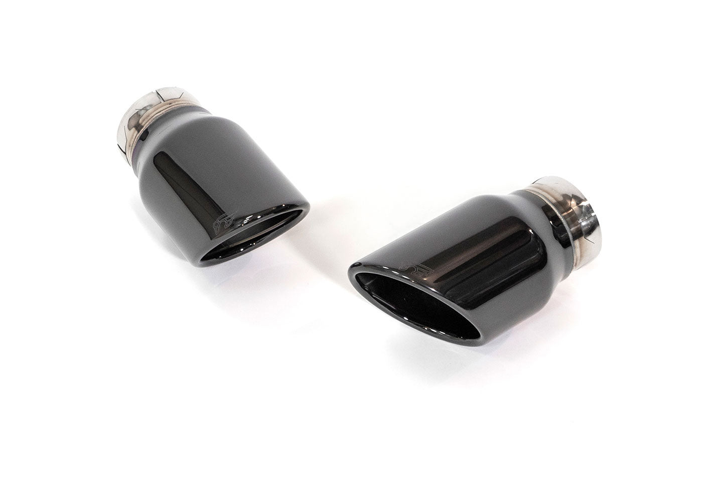 A front view of the chrome black tips of the IPE SS Cat-Back Exhaust System with Remote Control for Audi A4 / A5 B9 2.0 TFSI Quattro 2016-2019 on a white background