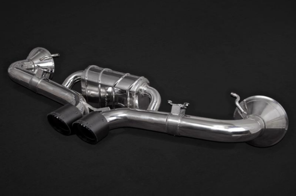 close view of Capristo Valved Exhaust Muffler with Carbon Tips (OE Actuators) for Porsche 992 GT3/RS 2021+ with black background