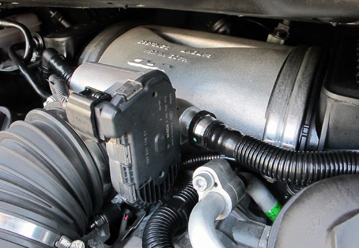 IPD DFI plenum installed in the engine bay behind the factory throttle body - IPD for Porsche 991.1 Carrera