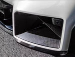 A close up view of AUTOTECKNIC DRY CARBON FRONT AIR INLET TRIM SET - BMW G87 M2 2023+ fitted on a car