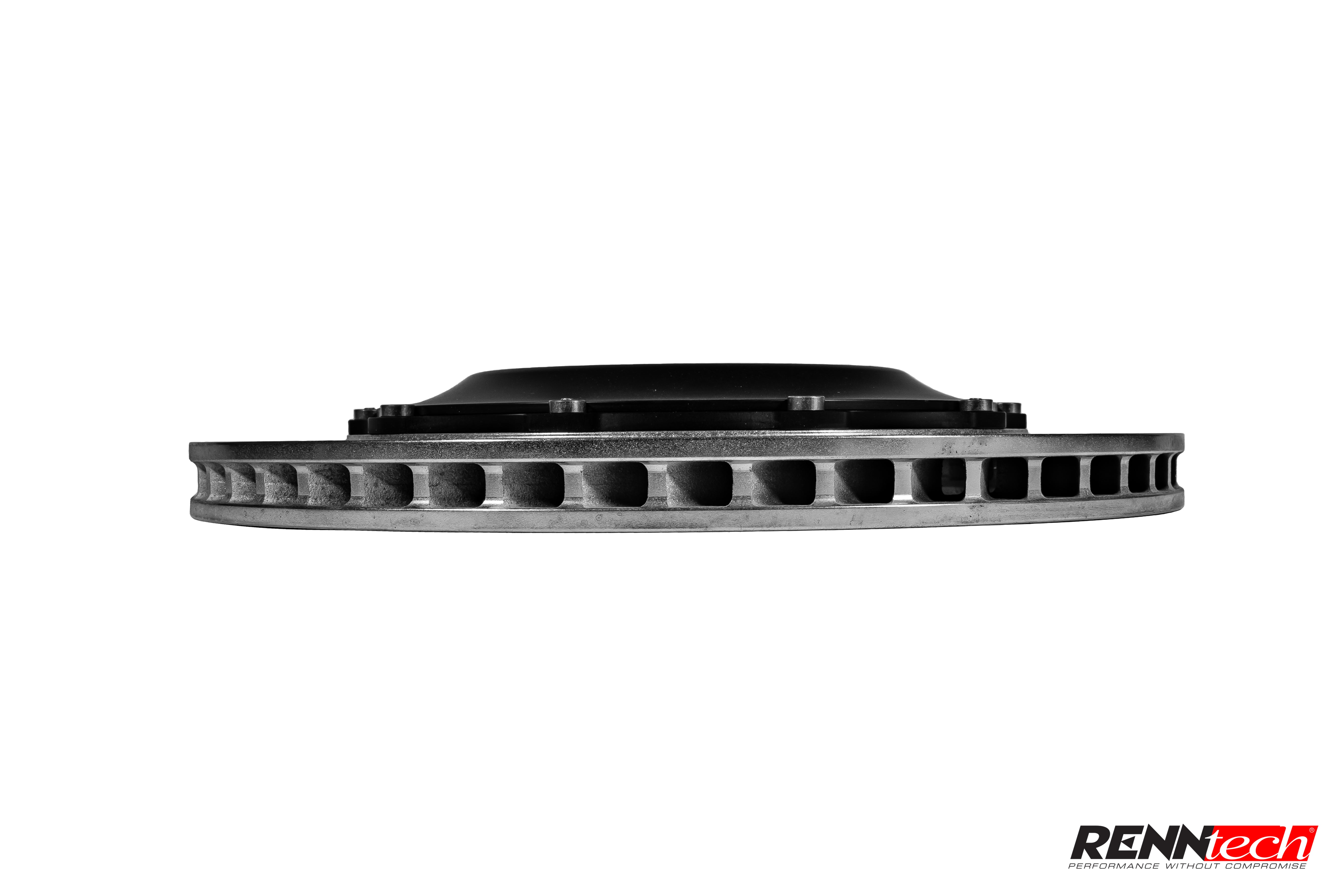 A side view of RENNtech Performance Brake Upgrade for for Mercedes-Benz C63 AMG 2016-2023 laying down with white background