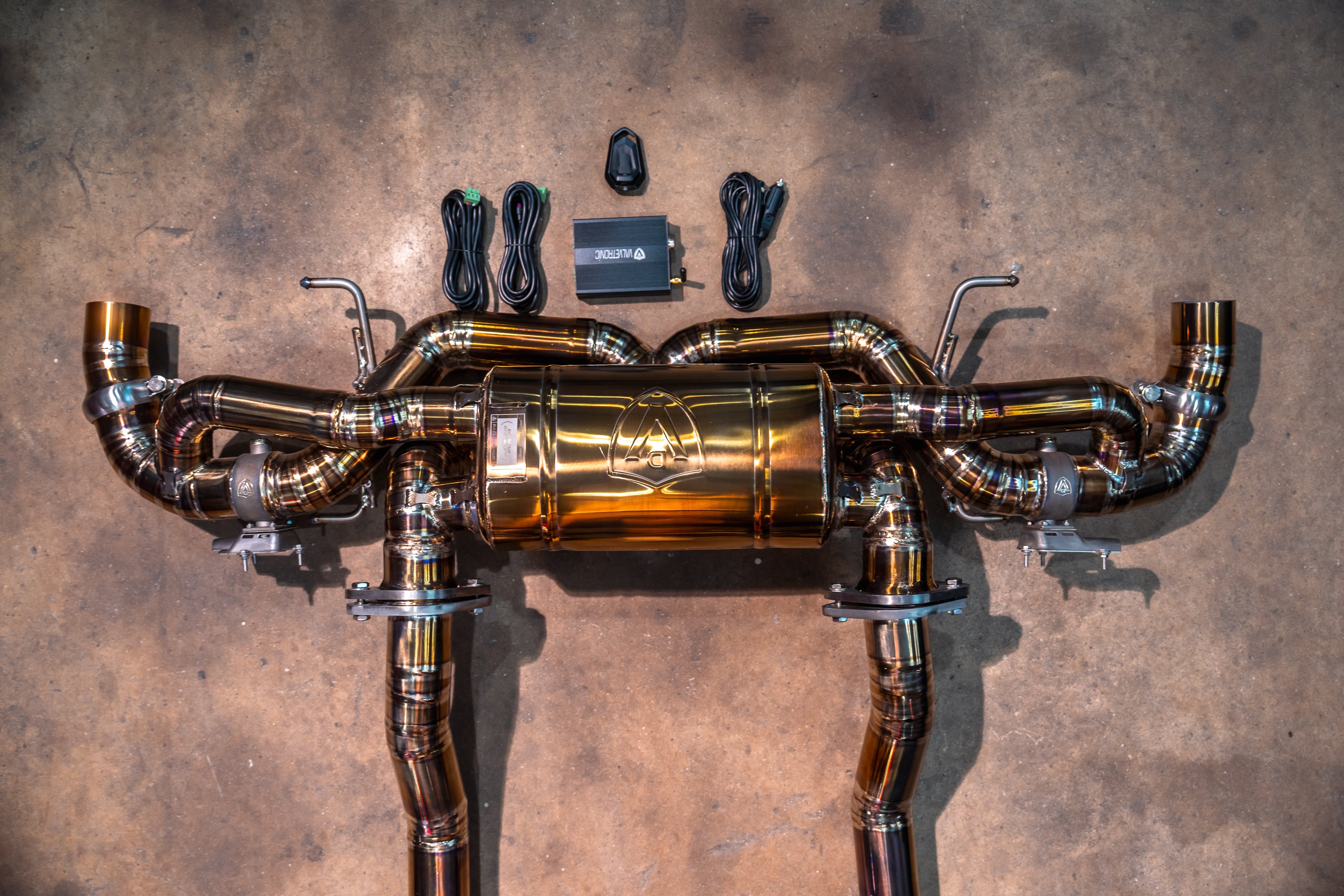 Valvetronic Designs Exhaust Aston Martin DB11 5.2L manufacturer gallery: rear muffler with paired branches and control kit above it