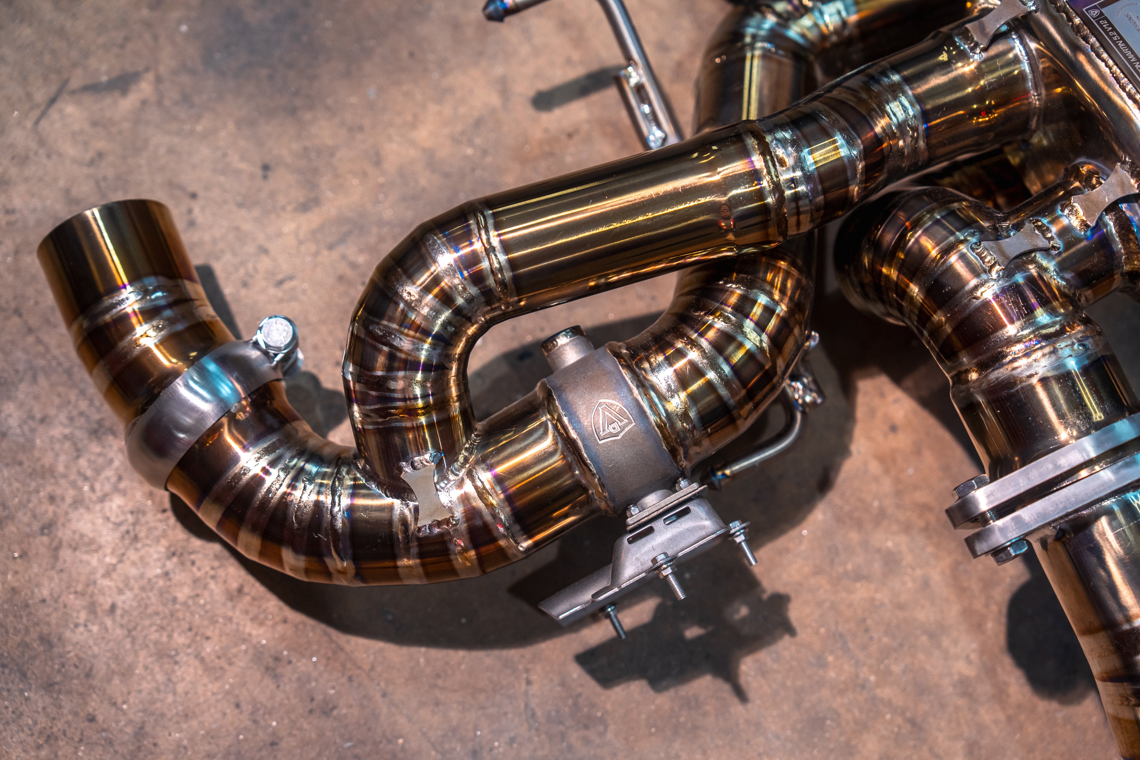 Valvetronic Designs Exhaust Aston Martin DB11 5.2L manufacturer gallery: segmented rear branch, valve housing and actuator