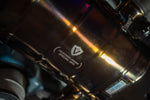 Valvetronic Designs Exhaust Range Rover Sport L494 manufacturer gallery: shield branding on an installed gold-toned muffler