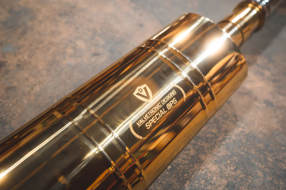 A close up view of Valvetronic Designs Valved Sport Exhaust System on the ground (for Mercedes Benz G-Wagon G550, G63 / Squared).