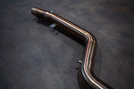 Stainless exhaust BMW X7 40i: curved rear outlet