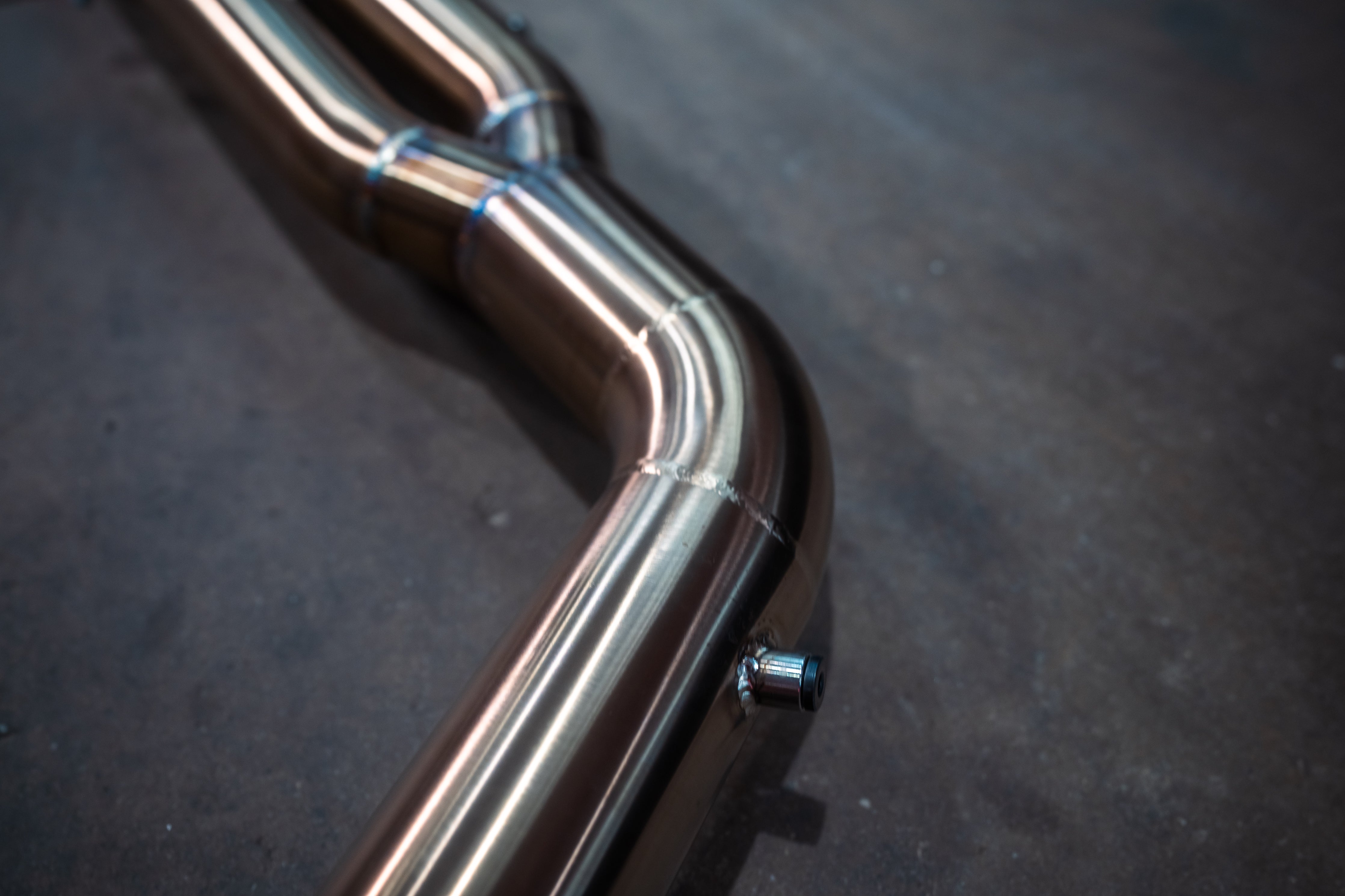 Stainless exhaust BMW X7 40i: midpipe bend