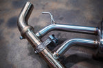 Stainless exhaust BMW X7 40i: rear muffler and valve routing