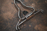 Stainless exhaust BMW X7 50i: rear section and paired center pipes