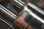 Stainless exhaust BMW X7 50i: rear section identification plaque