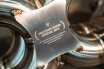 Stainless F1 exhaust Lamborghini Huracan: logo bridge on stainless pipes