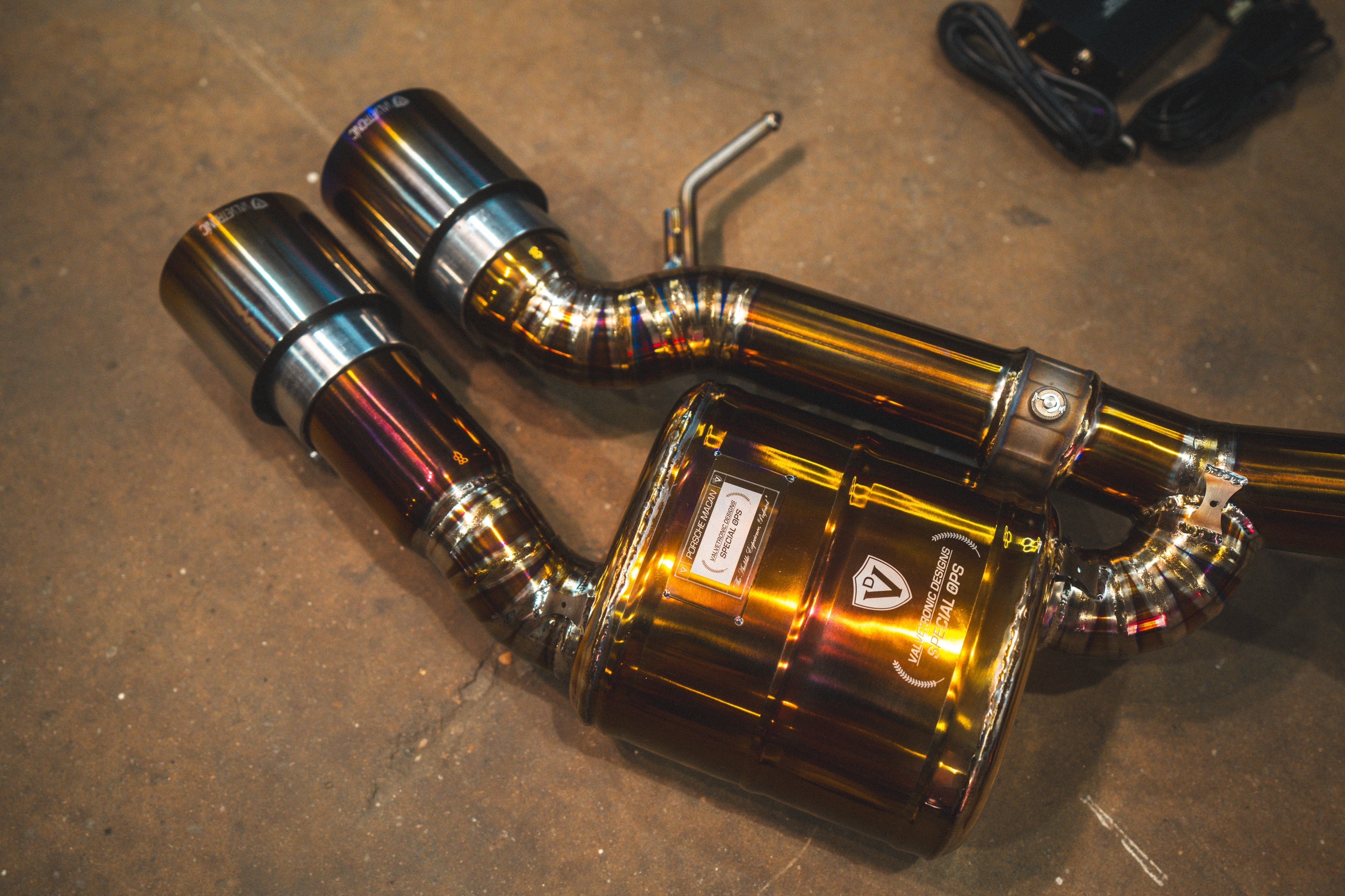 Valvetronic Designs Valved Exhaust Porsche Macan manufacturer gallery: rear muffler and two outlet tips viewed from above