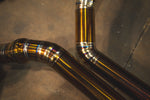 Valvetronic Designs Valved Exhaust Porsche Macan manufacturer gallery: parallel mid-pipe bends and segmented welds