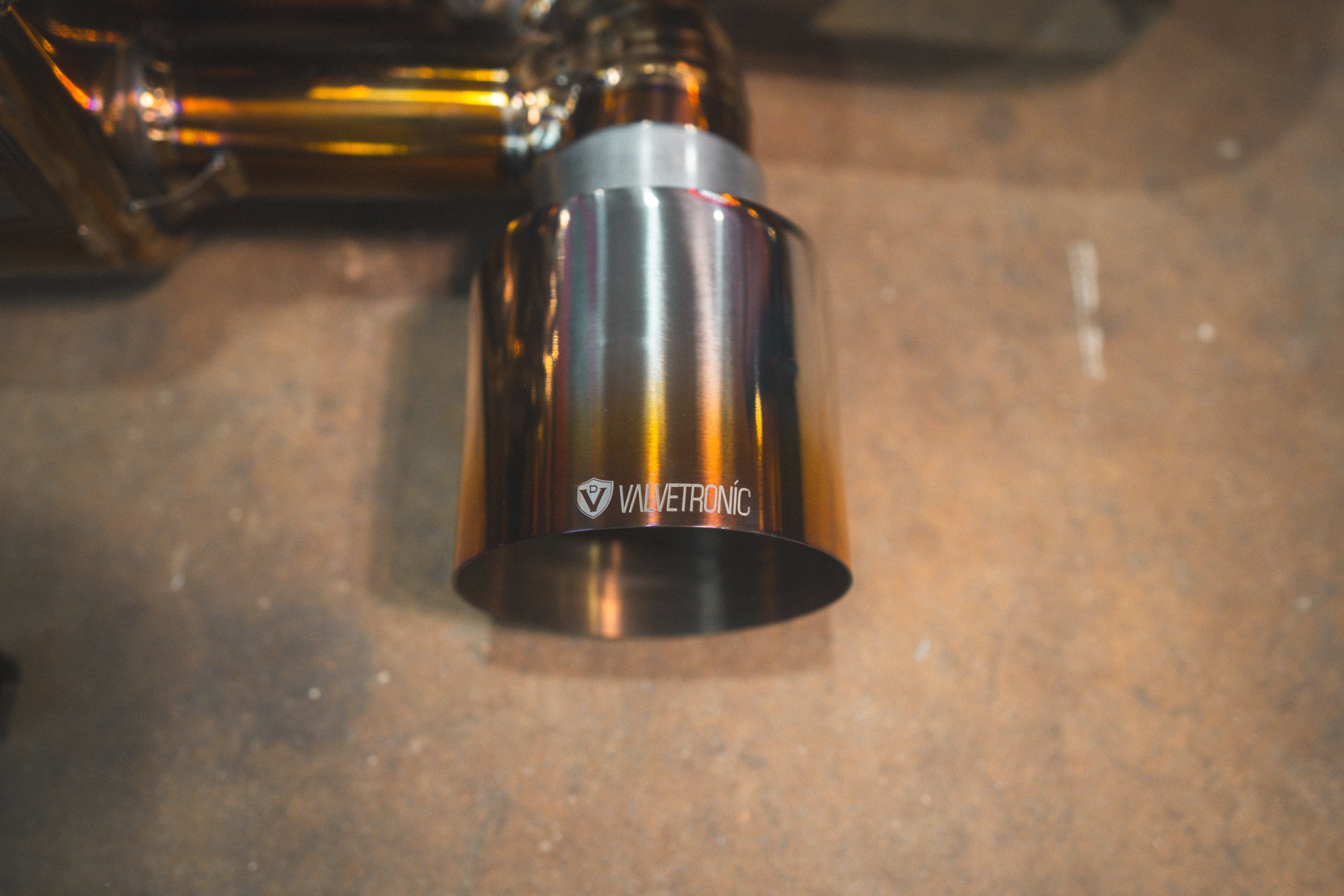 Valvetronic Designs Rear Exhaust Porsche 718 GT4 RS manufacturer gallery: single metal outlet tip viewed from the opposite side
