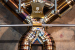 Titanium F1 exhaust McLaren 750S: central logo bridge