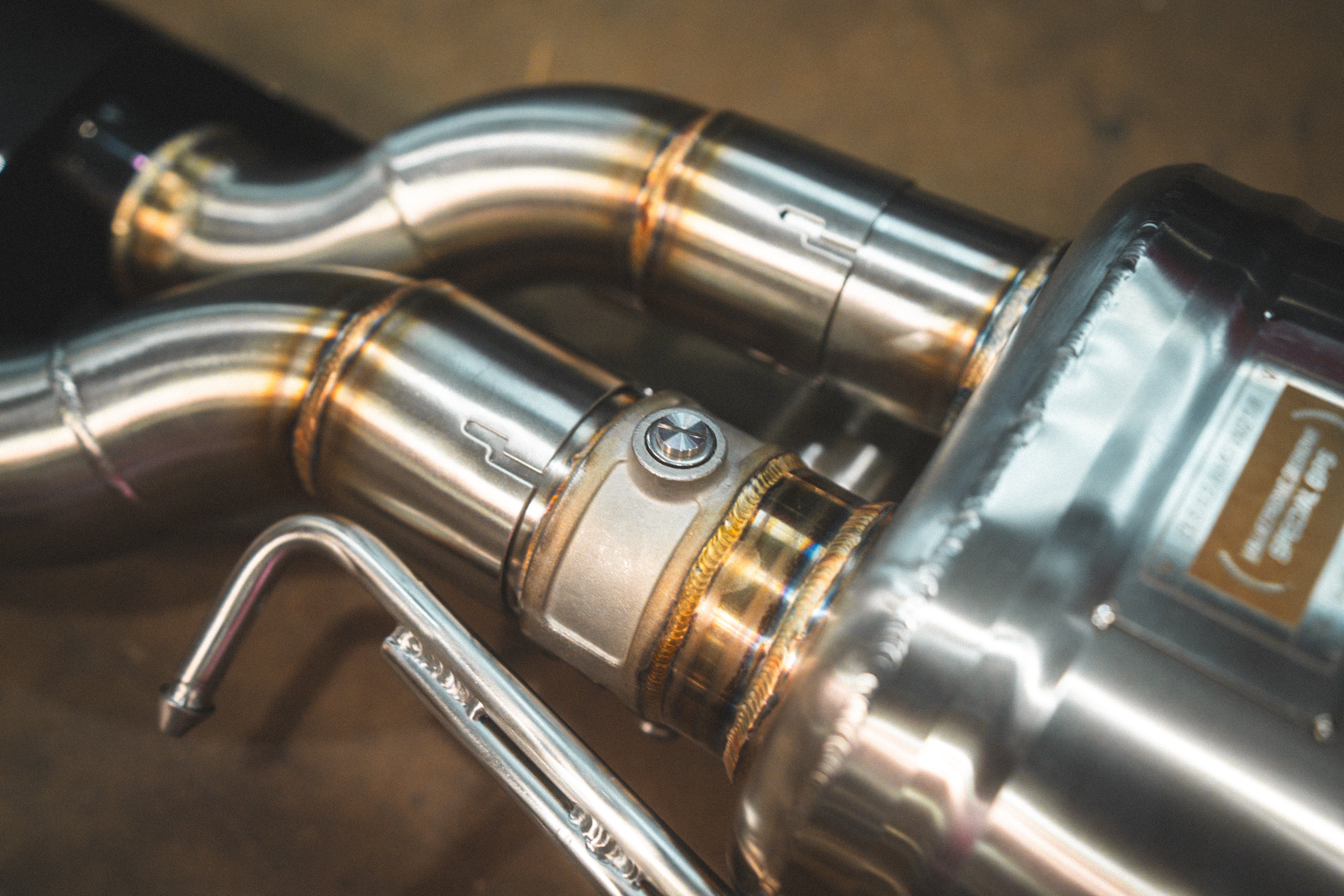 Valvetronic Designs Valved Exhaust AMG CLS63 W218 manufacturer gallery: valve housing, hanger and rear muffler junction