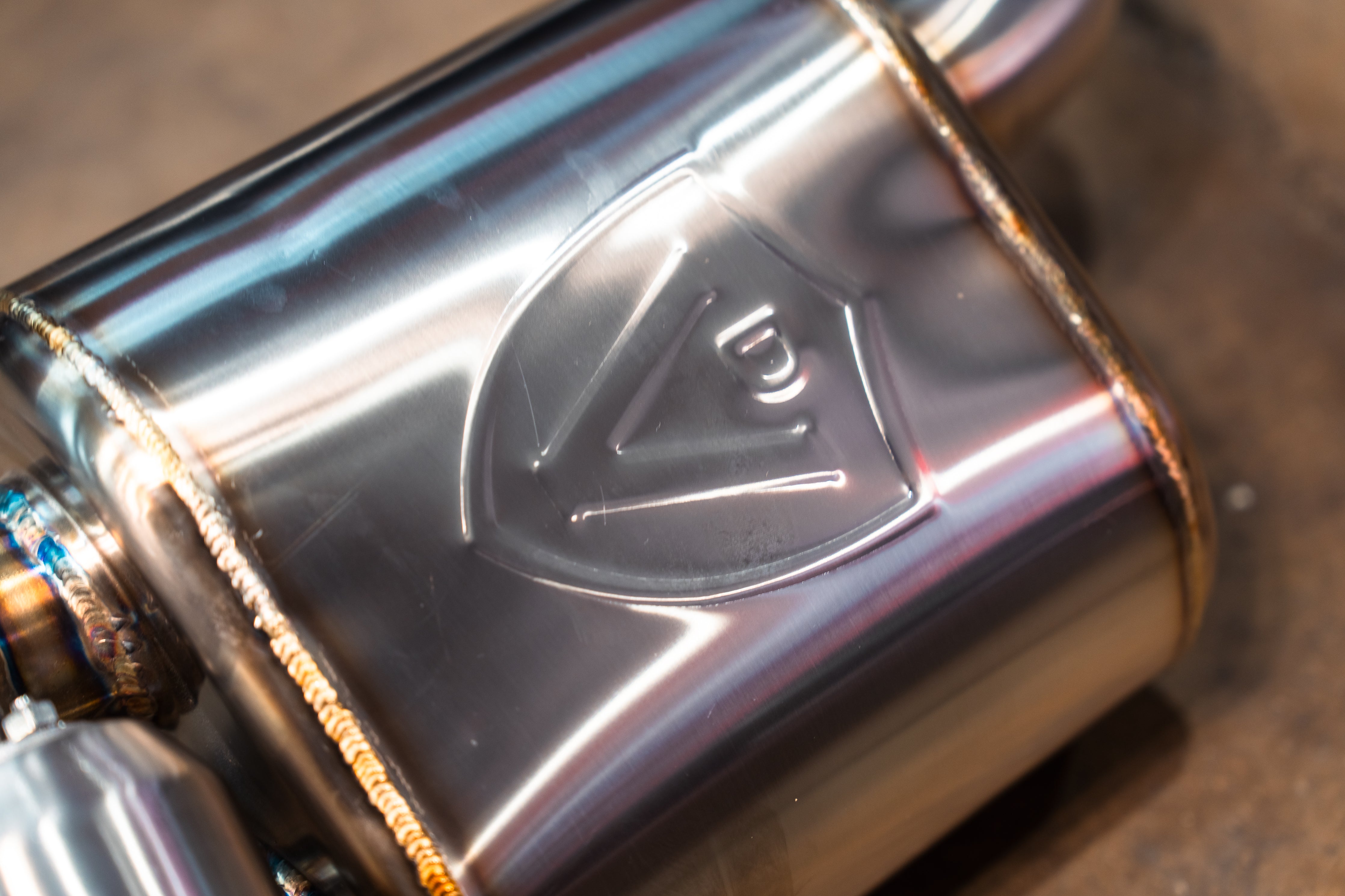 Valvetronic Designs Valved Exhaust Lexus RC F manufacturer gallery: embossed shield on the rear muffler shell