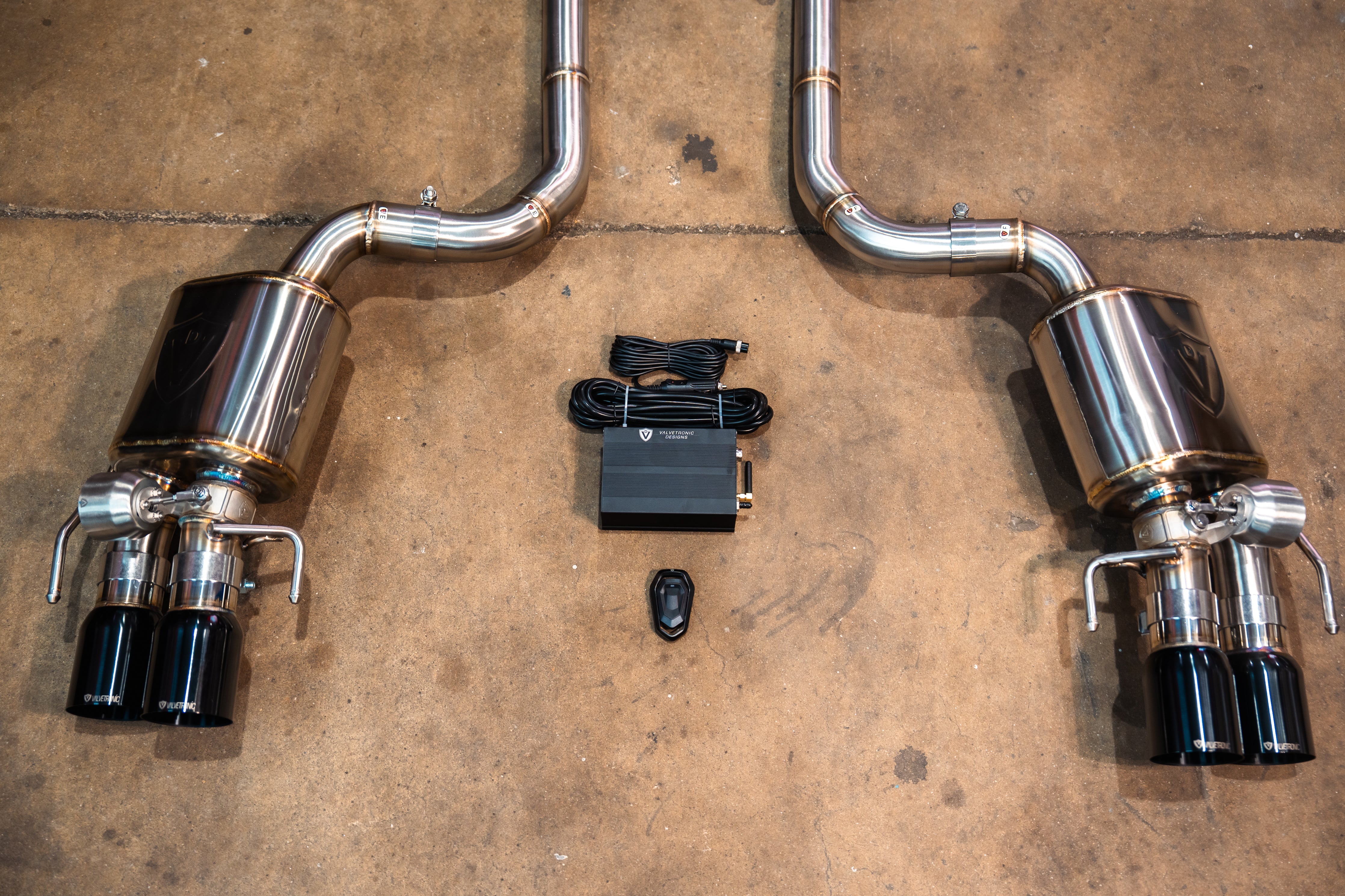 Valvetronic Designs Valved Exhaust Lexus RC F manufacturer gallery: twin rear mufflers and black tips with the control kit between them